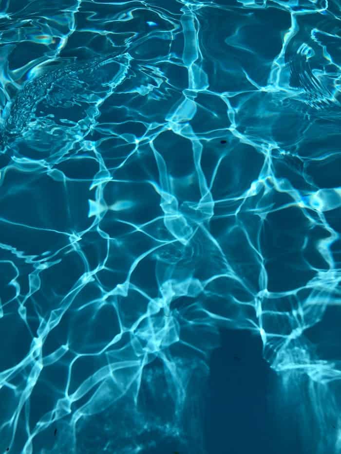 Crystal clear ripples and reflections in a Zurique swimming pool.